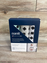 Nanit Breathing Band small three-pack for infants in retail packaging on wood background