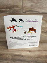 Back cover of Eric Carle baby book featuring illustrations of bear cubs, monkeys, and bunnies with text about baby love