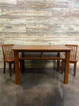 Front view of NEW Newton kids table and two chairs set in espresso with under-table storage shelf and slatted-back chairs
