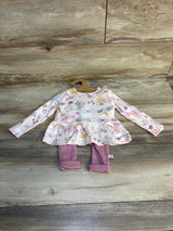Girls' long sleeve dress with animal print and pink leggings set on wood background