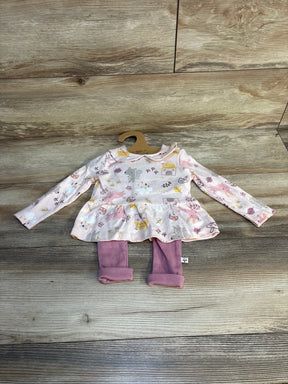 Girls' long sleeve dress with animal print and pink leggings set on wood background