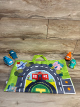 Top-down of Alasou 5-piece crane and car toy set showcasing colorful vehicles and printed road playmat on wood floor