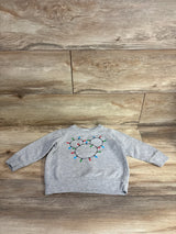 Gray kids sweater with festive Christmas lights design, perfect for holiday wear and resale shopping.