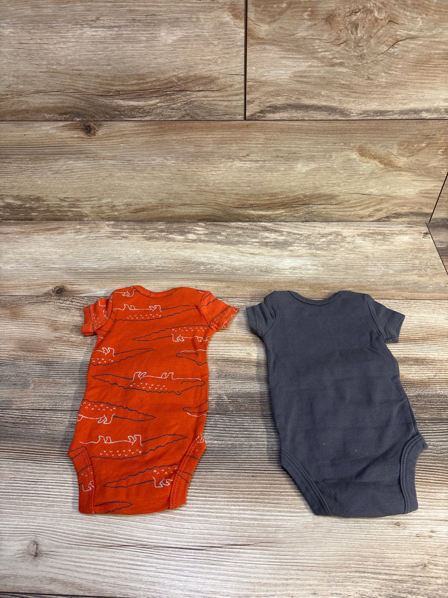 Carter's 2pk Bodysuits Orange sz Newborn