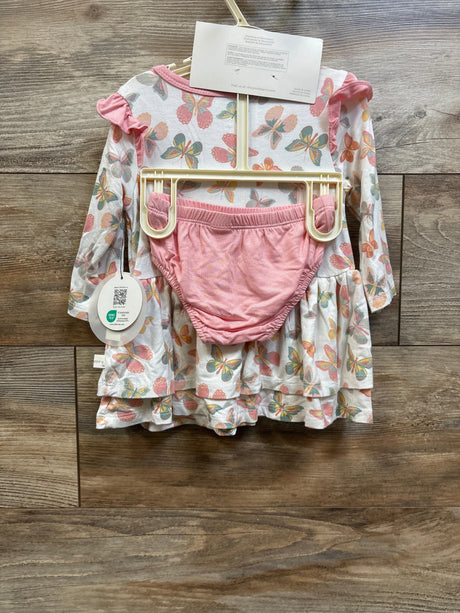 Front view of white 3-piece butterfly bamboo dress set with pink bloomers on a hanger over a wood floor