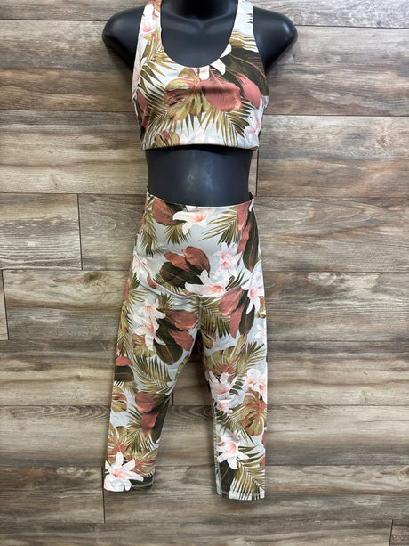 Front view of Old Navy maternity bra and high-waist leggings showing pink and green tropical print on grey with wood background