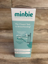 Front view of Minbie 6m+ feeding kit box showing teal packaging with headline The Closest Teat to Breastfeeding on wood backdrop