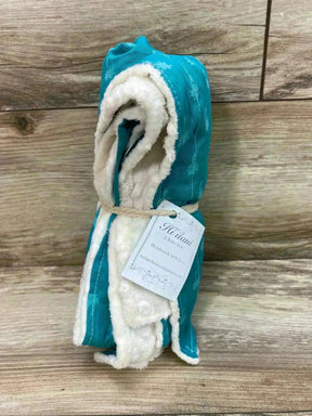 Folded Hi'ilani Hawaii Teal hooded baby blanket showing teal star print and cream lining tied with twine on wood backdrop
