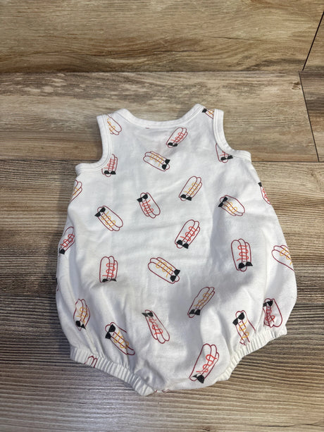 Flat lay front of Cat and Jack white baby bubble romper with hotdog print and elastic leg openings on wood background