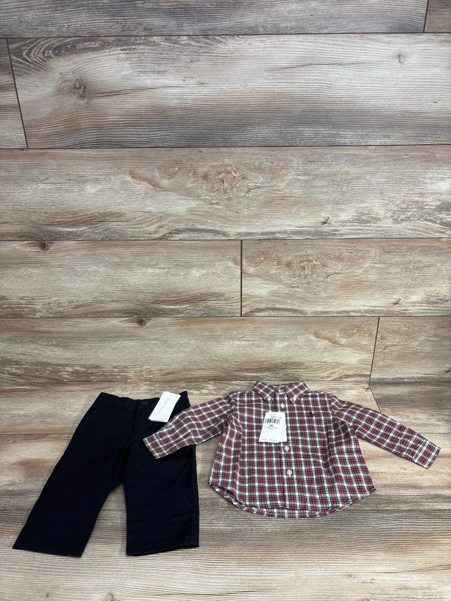 Children's outfit with navy pants and red plaid button-up shirt on wood floor, resale kids clothing