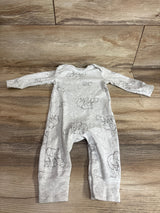 Flat lay of Carter's grey long-sleeve elephant print coverall size 6 months showcasing snap inseam closures on wood floor