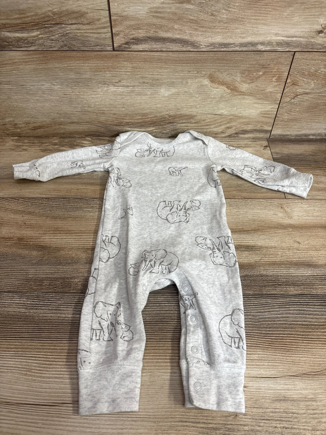 Flat lay of Carter's grey long-sleeve elephant print coverall size 6 months showcasing snap inseam closures on wood floor