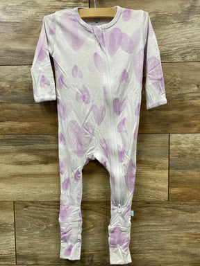 Light purple heart print baby sleeper with zipper on wooden background