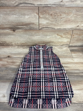 Flat-lay of Burberry Carlotta checked sleeveless dress (4T) showing front zipper and Peter Pan collar on wood background