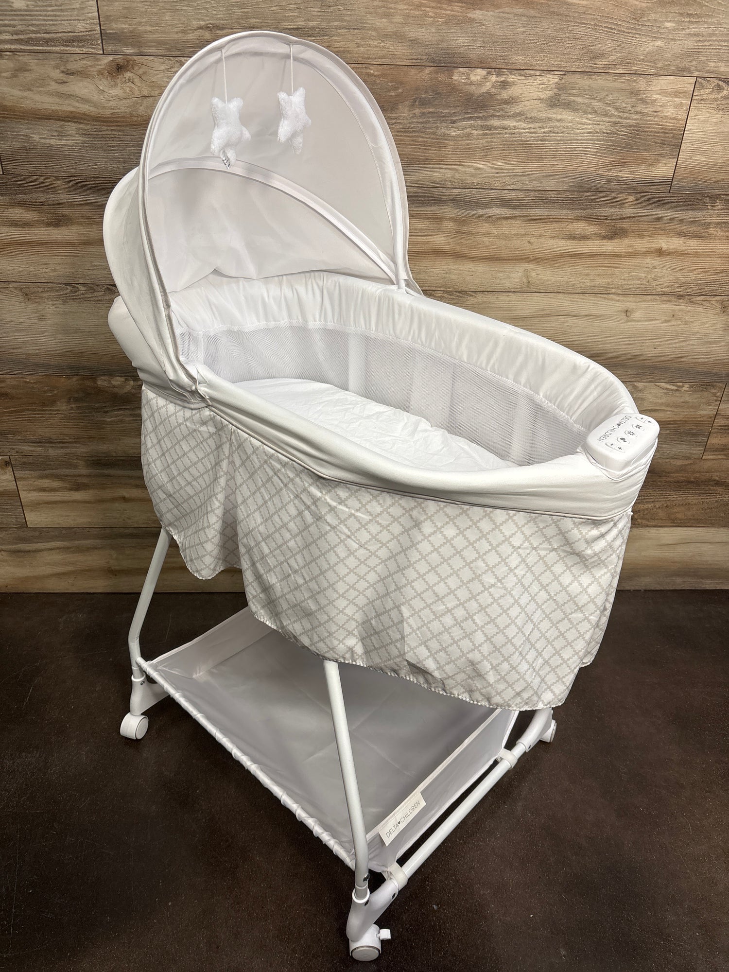 Delta Children Soothing Dreams Bassinet, White