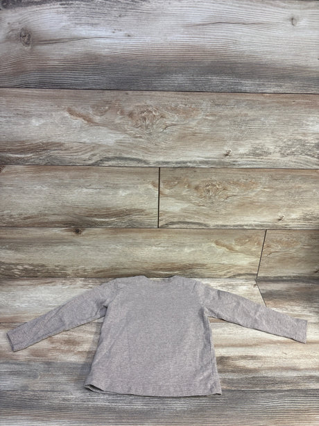 Back flat-lay of Pekkle toddler long-sleeve brown heather shirt showing long sleeves and curved hem on wood plank background