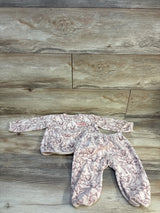Bambi baby pajama set with deer print, soft long-sleeve top and pants on wood floor