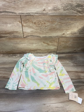 Pastel tie-dye long sleeve toddler shirt with ruffle shoulders on wood background
