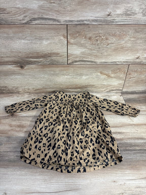 Leopard print long sleeve baby dress on wood background, gently used kids clothing