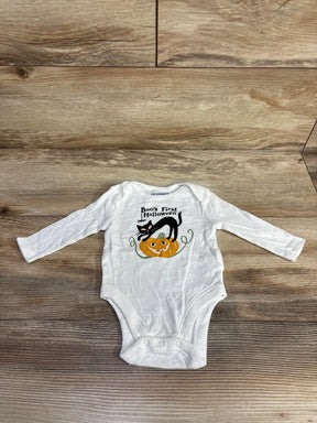 White baby onesie with 'Boo's First Halloween' design, black cat, and pumpkin on wood floor