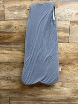 Back view of BubblePanda bamboo sleep sack size S (0–6 months) showing sleeveless top and rounded footed bottom on wooden floor background