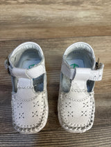White baby girl Mary Jane shoes with lace trim, soft sole for infants, perfect for first steps and special occasions.