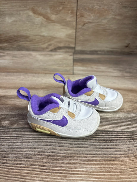 Three-quarter view of Nike Air Max 90 CB White Action Grape crib sneakers, size 2C, with purple accents on wood grain