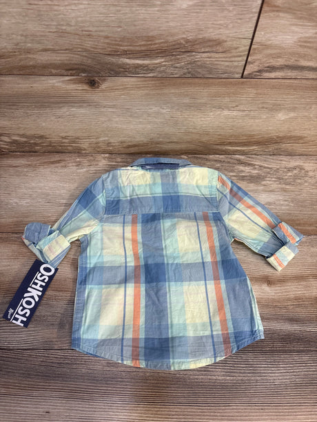 Back view of NEW Oshkosh Button-Up Shirt and Bowtie sz 12m showcasing blue cream and orange plaid long sleeve shirt with Oshkosh hangtag on wood plank floor