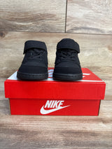 Black Nike toddler sneakers with velcro straps on red shoebox, kids footwear for resale