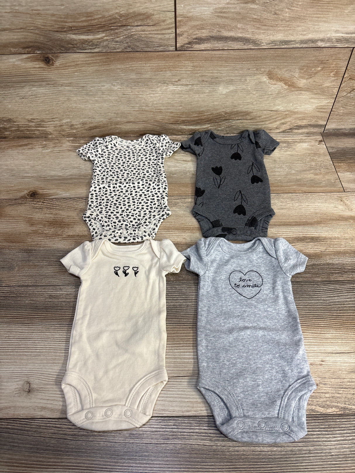 Carter's 4pk Rose Print Bodysuits Cream sz Preemie