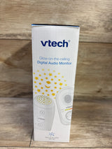Front view of VTech Glow-on-the-Ceiling baby monitor box showing star-projection night-light graphic on wooden background