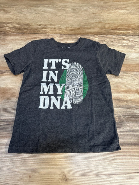 Kids charcoal t-shirt with 'It's In My DNA' and fingerprint graphic, laid flat on wood