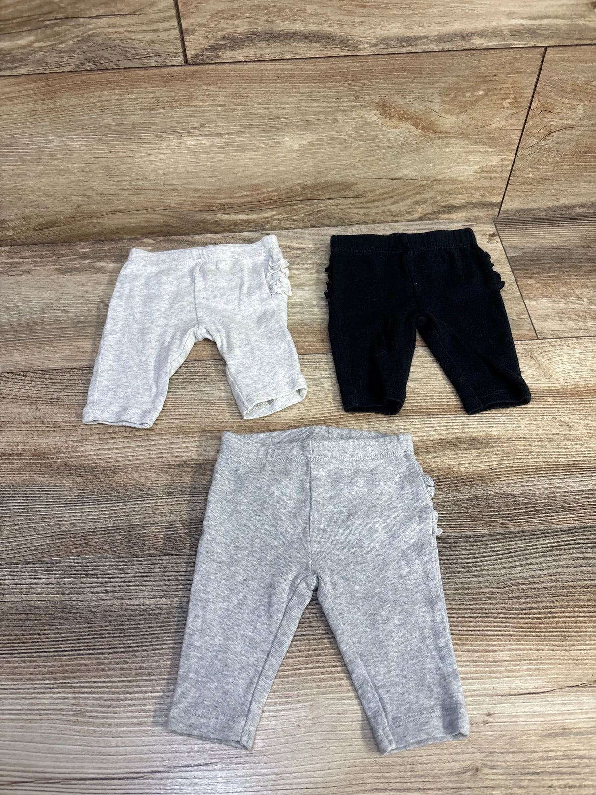 Carter's 3pk Ruffle Pants Black sz Newborn