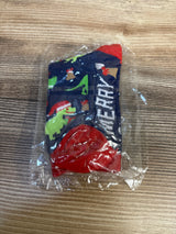 Kids' Christmas dinosaur socks with festive print, red cuffs, packaged for resale