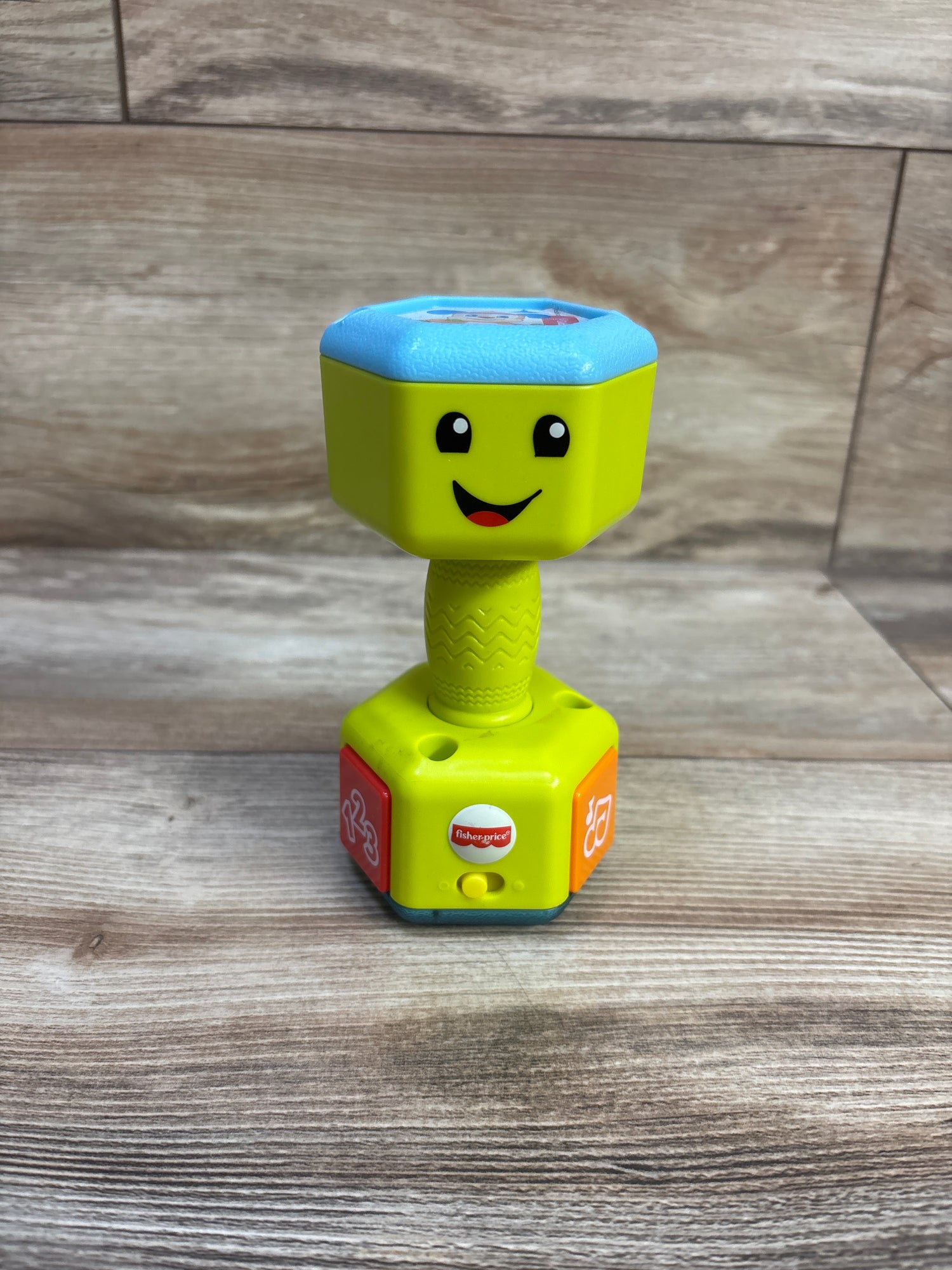 Fisher-Price Laugh & Learn Countin' Reps Dumbbell Rattle Green