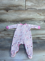 Flat lay of Little Beginnings waffle knit footed sleeper, pink floral print, size 3-6 months, on wood plank background