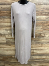 Front view of grey ribbed long-sleeve maternity dress (size M) showing crew neckline, slim fit over bump and side slit on wood background