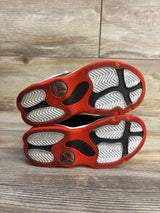 Red and black Jordan 11 soles with silver Jumpman logo, kids' size, resale
