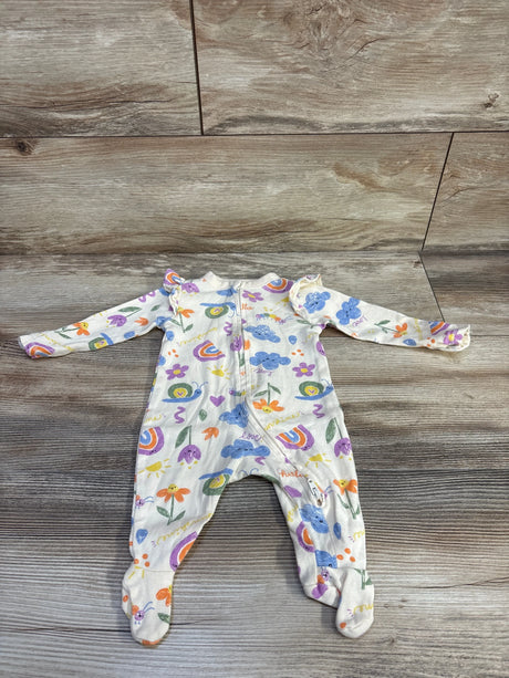 Front view of Old Navy newborn footed sleeper in beige with rainbow, cloud and flower print and ruffle shoulders on wood floor