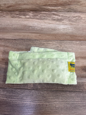 Top-down view of Happi Tummi colic and gas relief waistband, light green minky with dimpled texture and yellow tag on wood