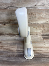 Side view of IvyWind wall-mounted baby shower stand showing adjustable cream plastic bracket with suction-cup mounts on wood backdrop