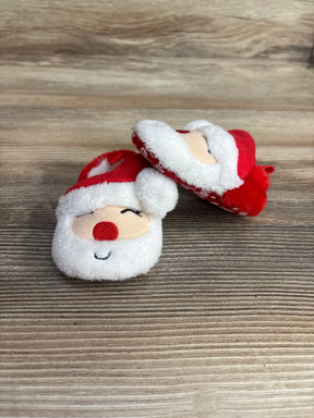 Adorable Santa-themed baby booties with red hat and white beard, perfect for holiday outfits.