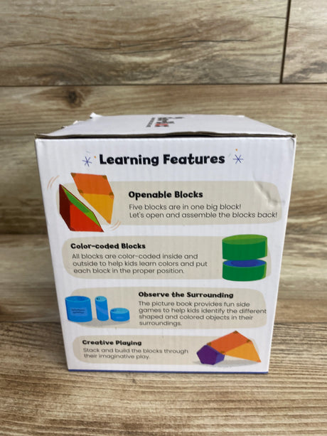 Children's educational toy box showing learning features like openable color-coded blocks and creative play