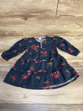 Navy blue long sleeve toddler dress with pink floral print and ruffle details, flat lay