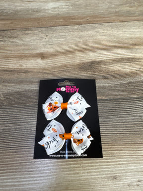 White Halloween hair bows with orange accents, 'Trick or Treat' text, perfect for kids' fall outfits