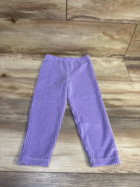 Monica + Andy purple ribbed velour pull-on pants for toddlers on a wooden background