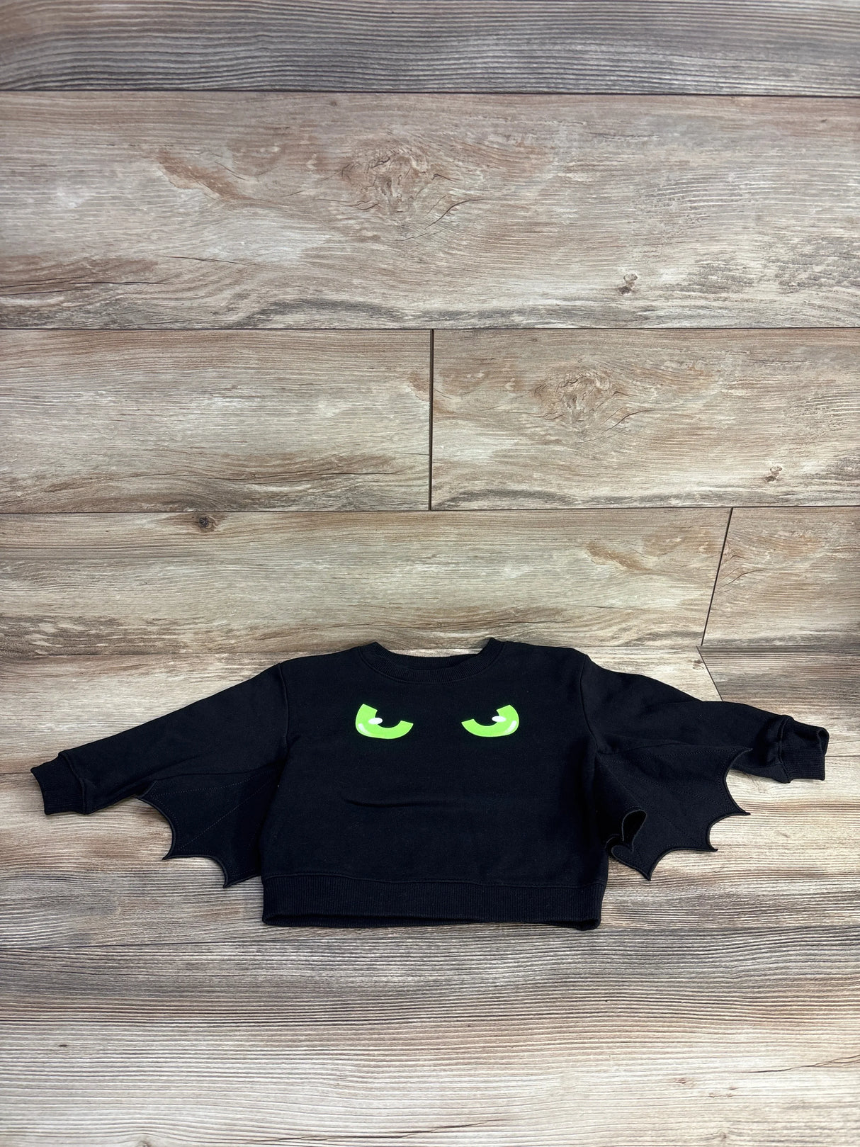 Black kids Halloween sweatshirt with green eyes and bat wings