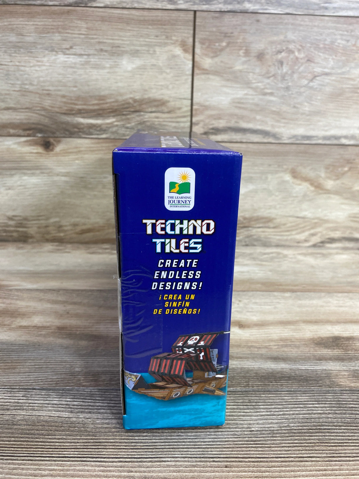 Techno Tiles construction toy box with create endless designs text and pirate ship image