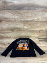 Black kids long sleeve shirt with 'Championship Finals 94 National League' graphic on wood floor