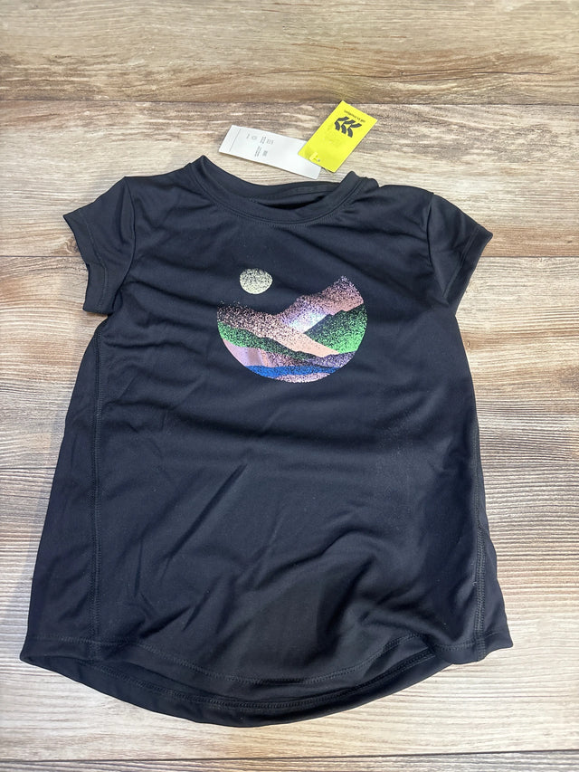 Flat-lay of 4T black short-sleeve active shirt with sparkly mountain-and-moon graphic on wood background, tags attached